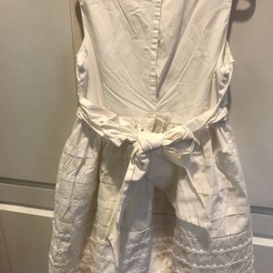 Beautifully detailed white dress by Hartstrings